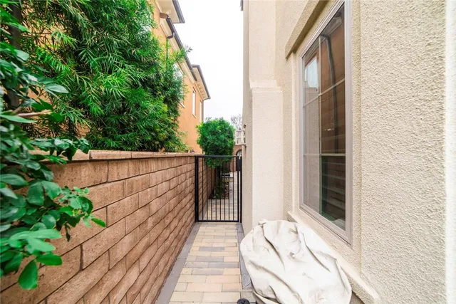 a balcony with view of wooden floor