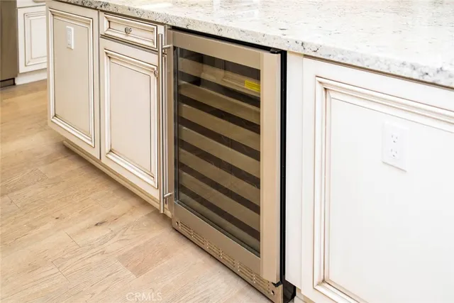 a stove top oven sitting inside of a kitchen