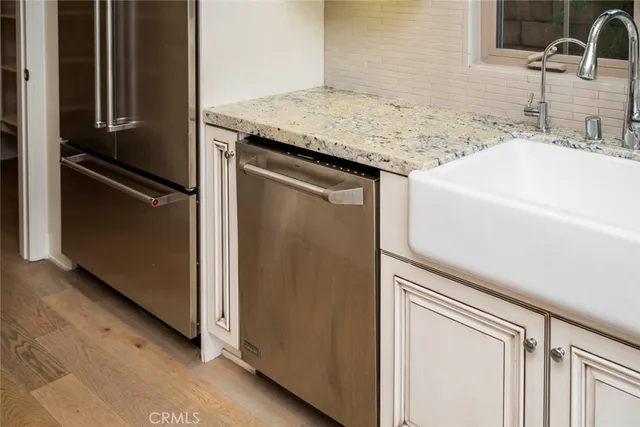 a view of a roof deck with table and chairs