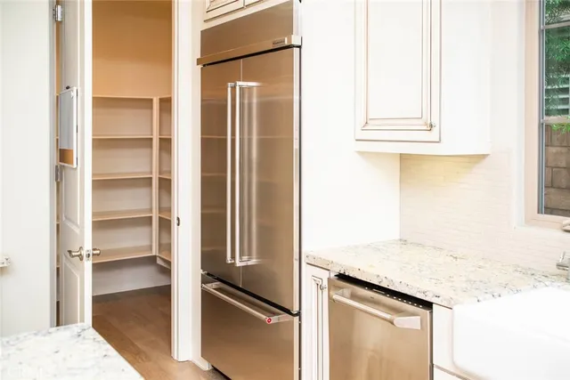 a view of field with trees in the background