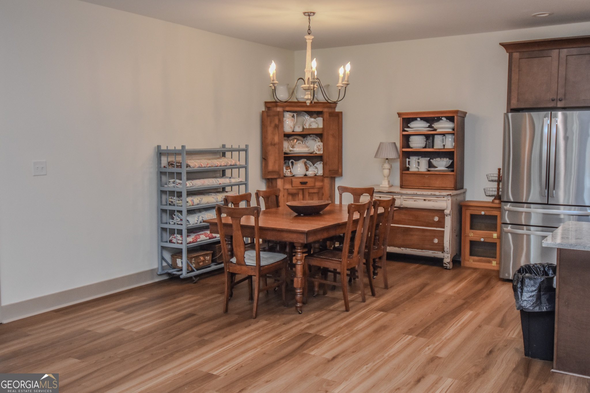580-i B I B Howard Road Williamson, GA 30292 - Photo 14 of 123 a view of a dining room with furniture and wooden floor