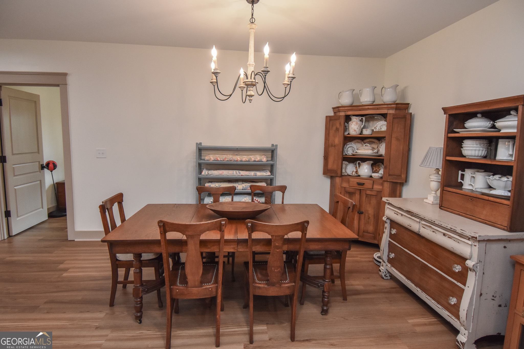 580-i B I B Howard Road Williamson, GA 30292 - Photo 26 of 123 a view of a dining room with furniture and chandelier