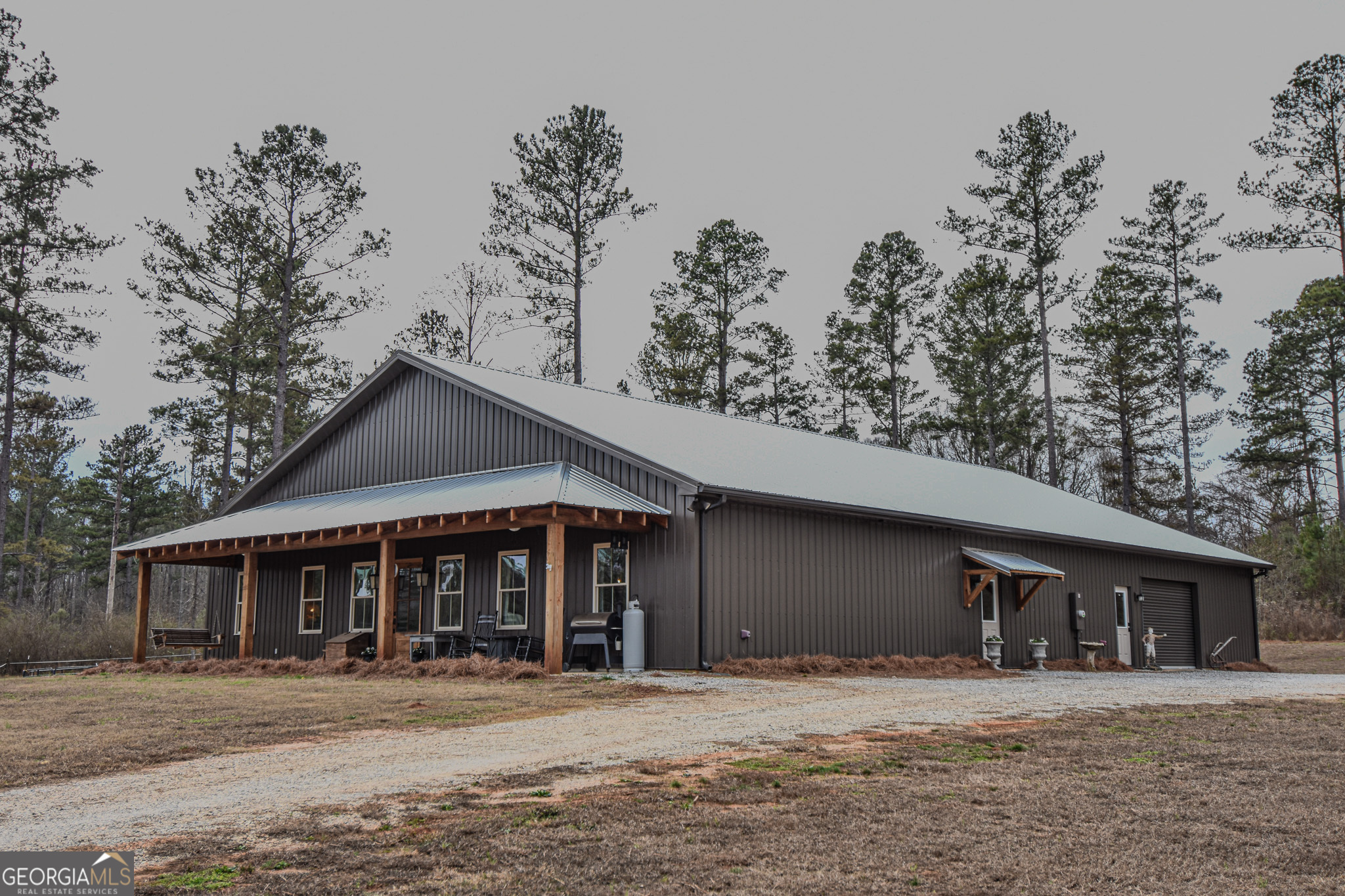 580-i B I B Howard Road Williamson, GA 30292 - Photo 3 of 123 a front view of a house with a yard