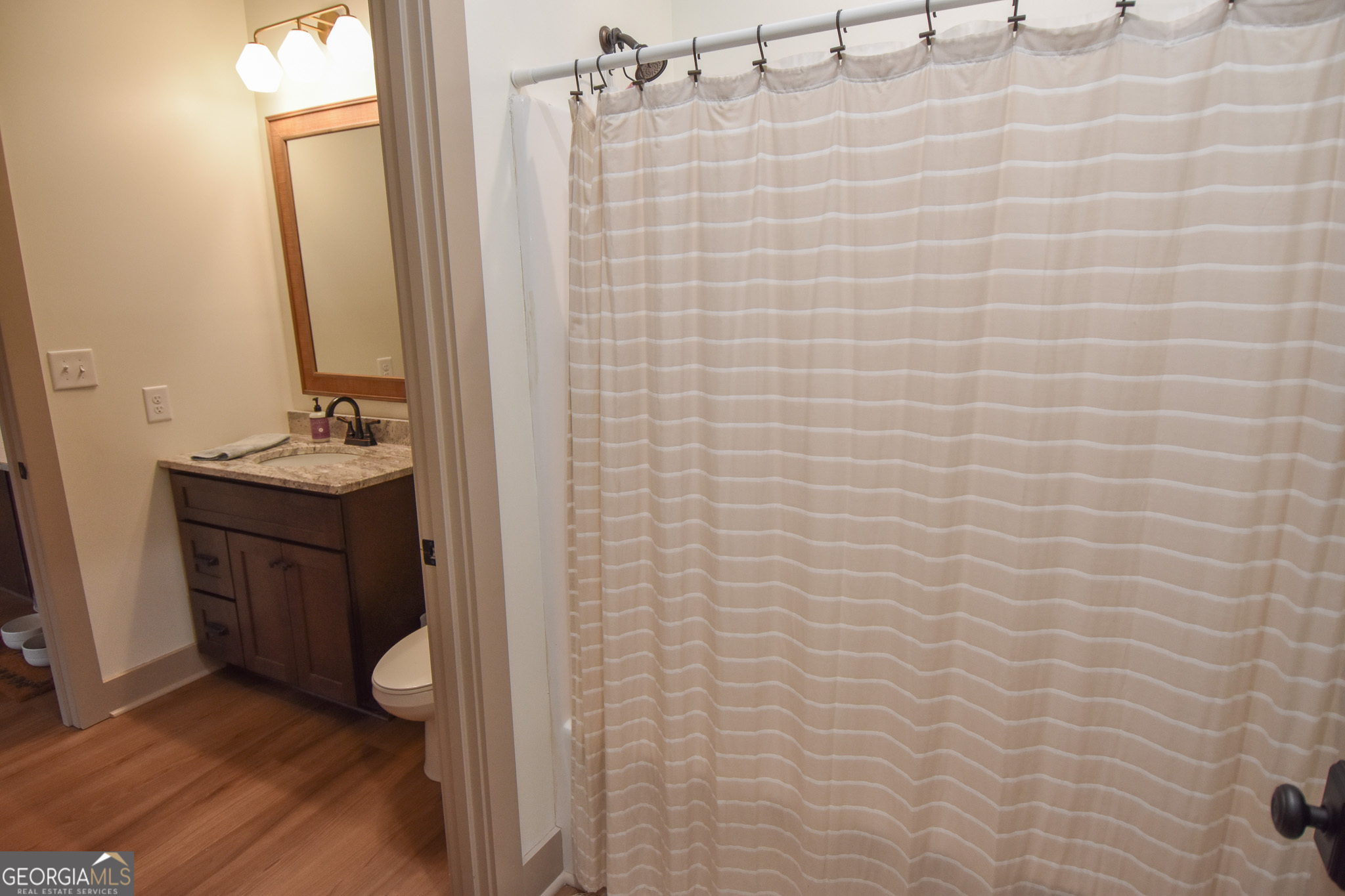 580-i B I B Howard Road Williamson, GA 30292 - Photo 40 of 123 a bathroom with a sink a toilet and shower