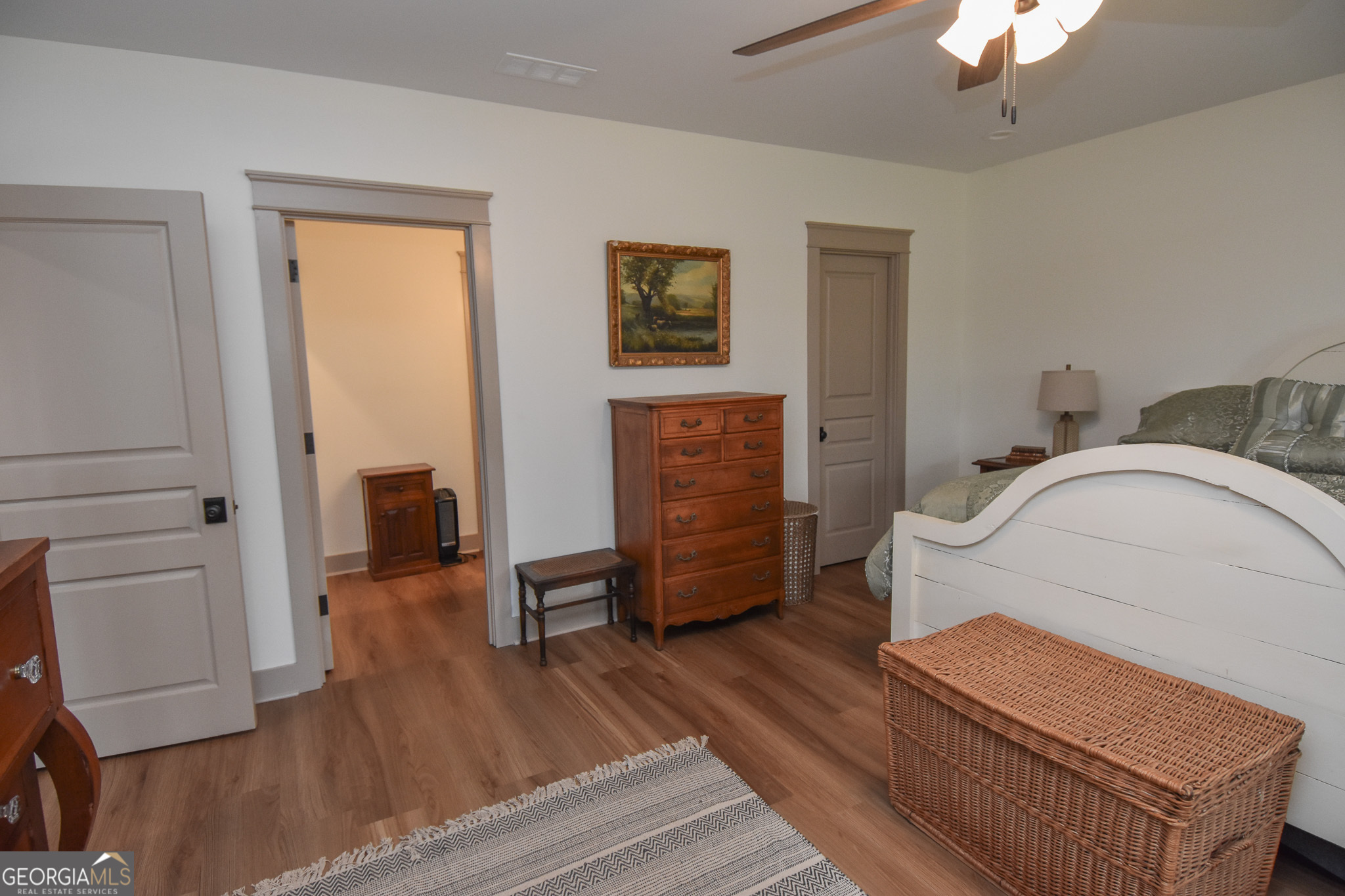 580-i B I B Howard Road Williamson, GA 30292 - Photo 47 of 123 a bedroom with furniture and wooden floor