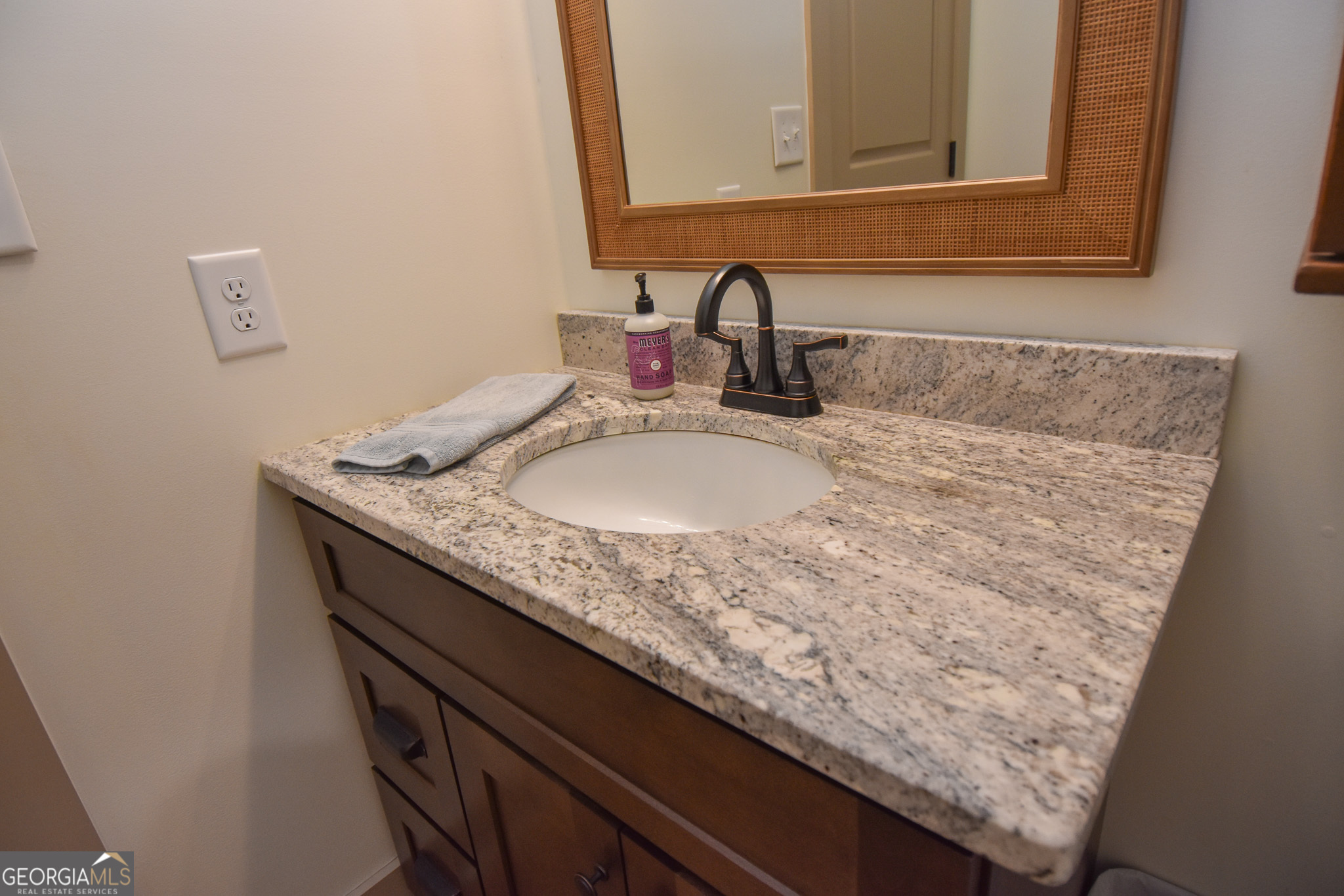 580-i B I B Howard Road Williamson, GA 30292 - Photo 53 of 123 a bathroom with a granite countertop sink and a mirror