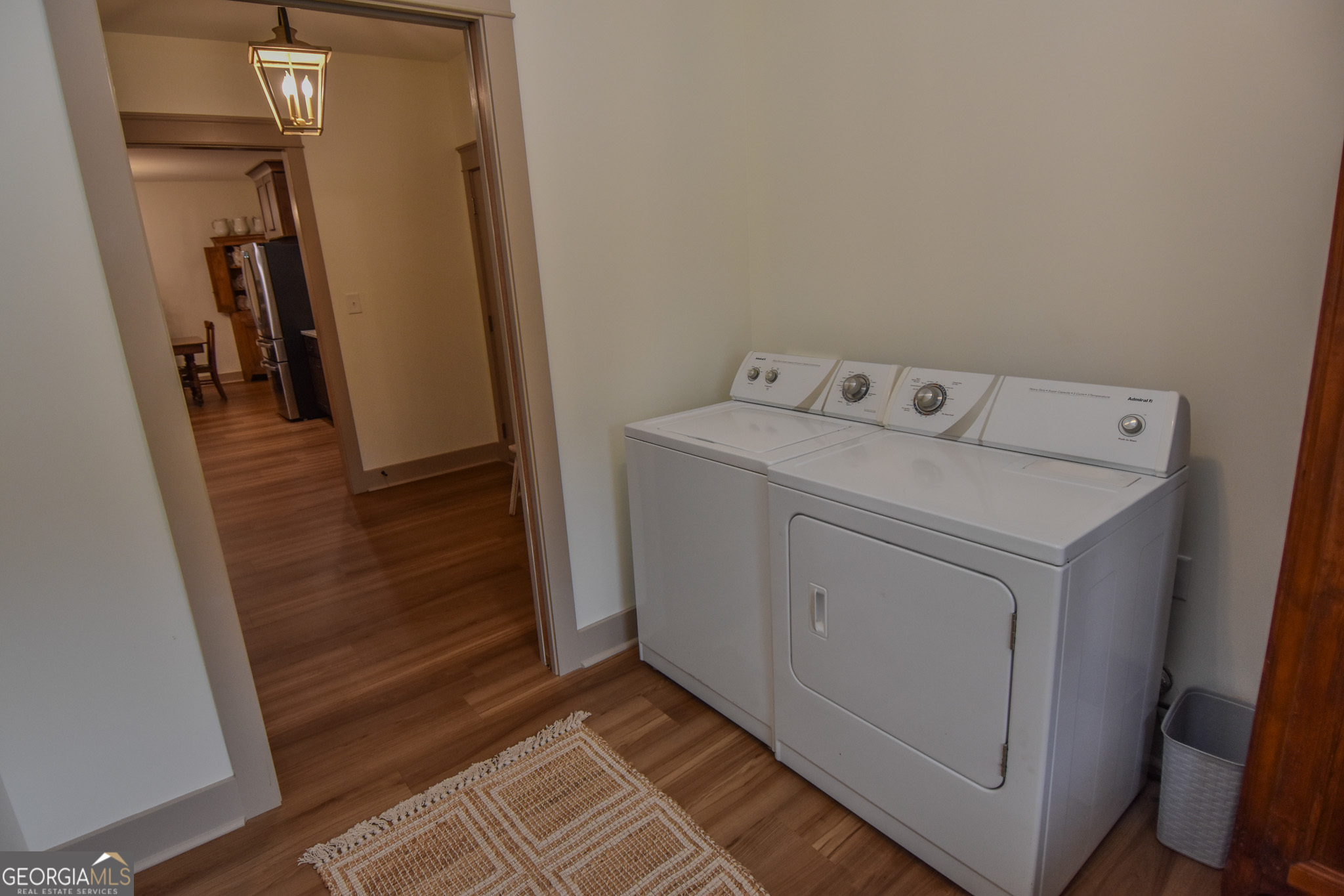 580-i B I B Howard Road Williamson, GA 30292 - Photo 57 of 123 a utility room with cabinets washer and dryer