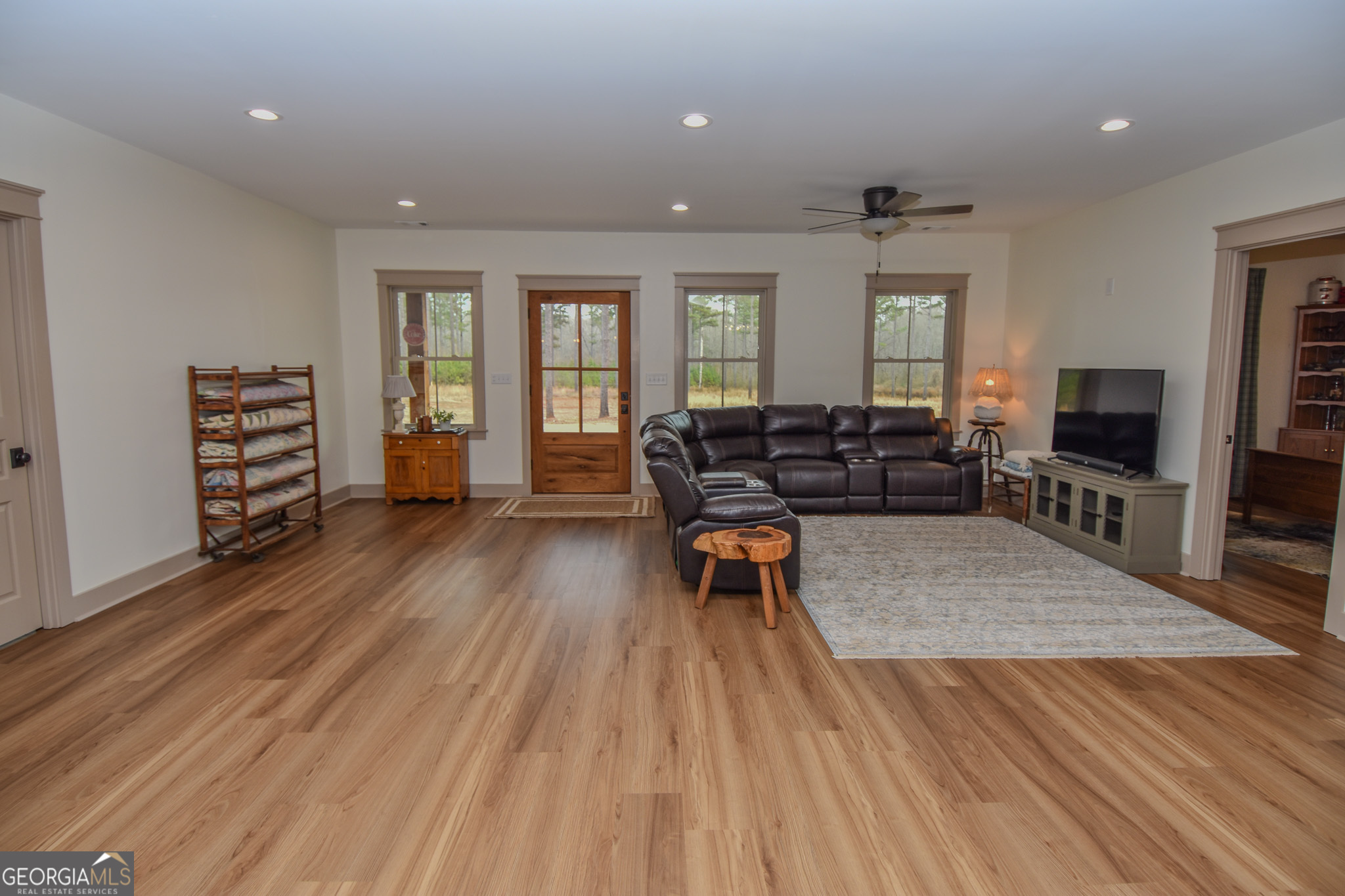 580-i B I B Howard Road Williamson, GA 30292 - Photo 7 of 123 a living room with furniture and wooden floor