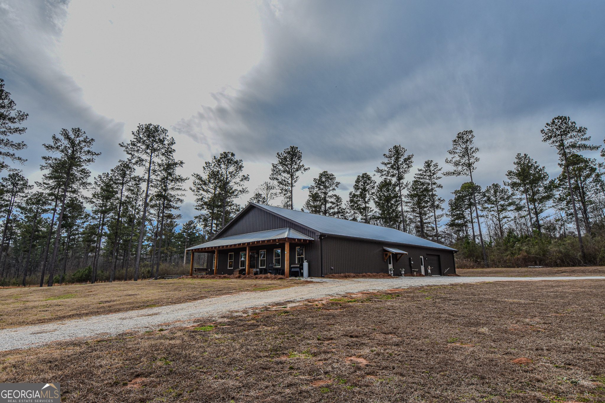 580-i B I B Howard Road Williamson, GA 30292 - Photo 84 of 123 a front view of a house with a yard