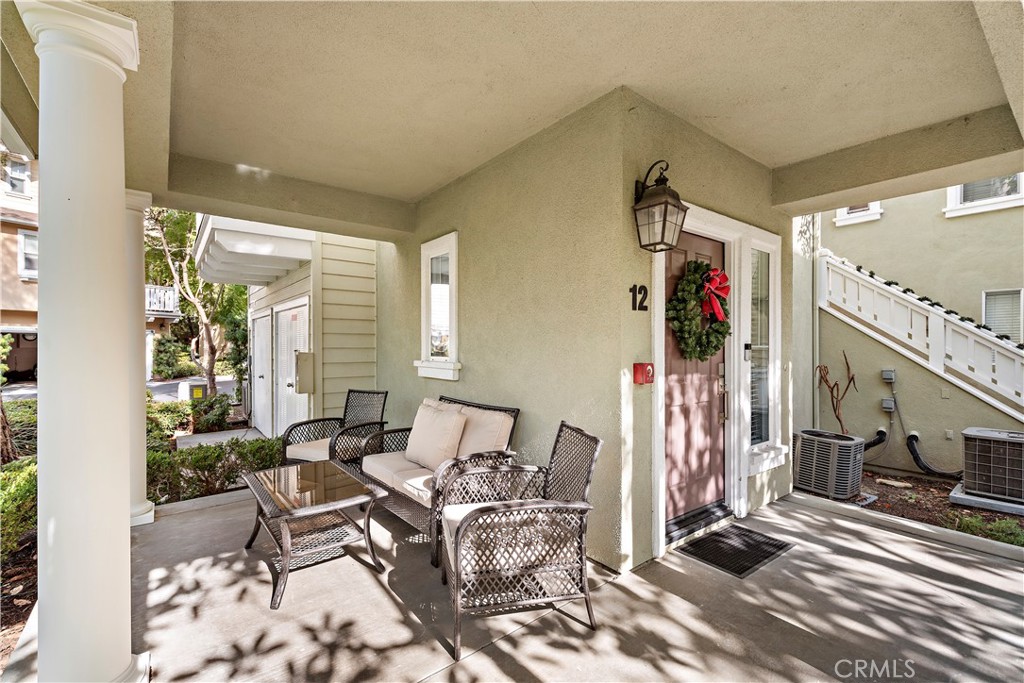 12 Triad Lane Ladera Ranch, CA 92694 - Photo 2 of 32 a living room with furniture and a flat screen tv
