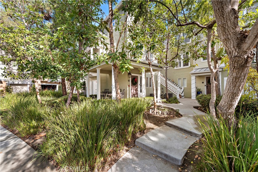 12 Triad Lane Ladera Ranch, CA 92694 - Photo 25 of 32 a front view of a house with garden
