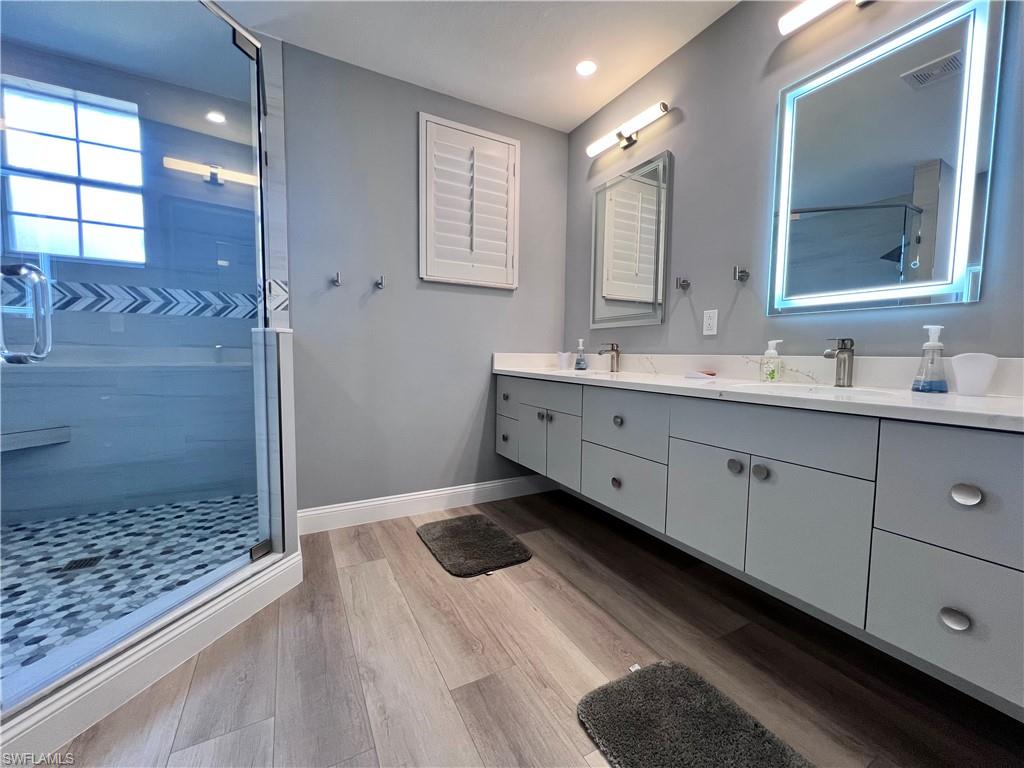 817 Regency Reserve Circle, Unit 3901 Naples, FL 34119 - Photo 16 of 34 Master Bathroom