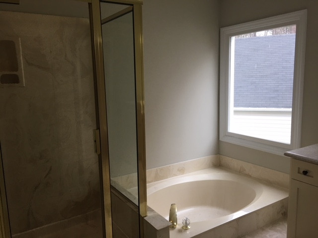 8105 Greywinds Drive Raleigh, NC 27615 - Photo 13 of 18 Master Bath Sep Tub/Shower