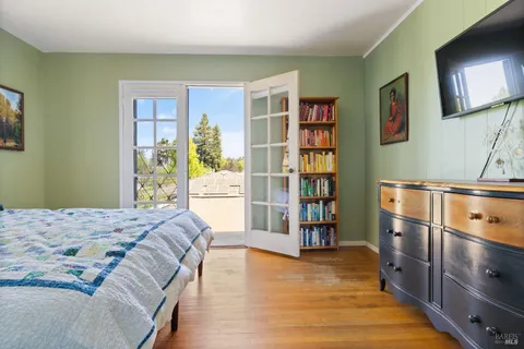 a bedroom with a bed and a cabinets