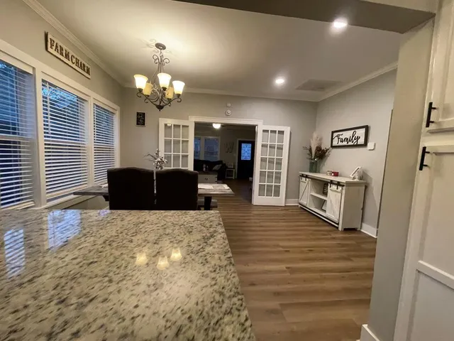 a view of a kitchen with furniture and a kitchen