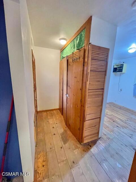 832 Katherine Road Simi Valley, CA 93063 - Photo 20 of 34 an empty room with wooden floor and white walls