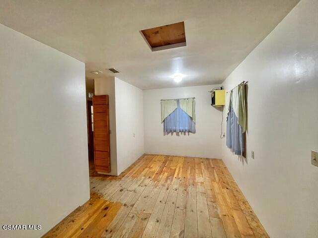 832 Katherine Road Simi Valley, CA 93063 - Photo 21 of 34 a view of empty room with a window and wooden floor