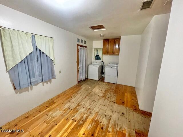 832 Katherine Road Simi Valley, CA 93063 - Photo 22 of 34 a bedroom with a bed and wooden floor