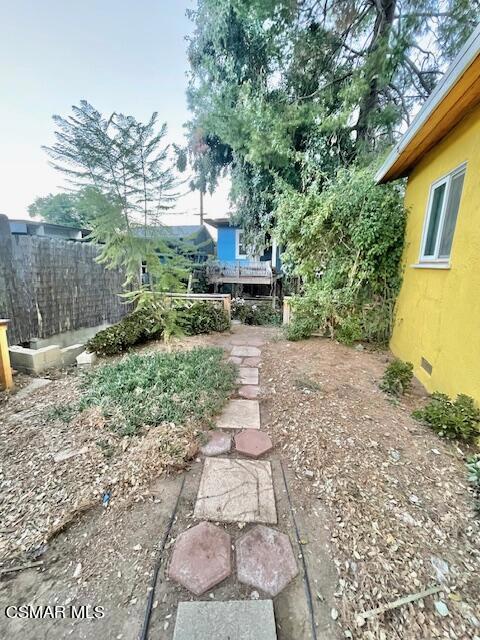 832 Katherine Road Simi Valley, CA 93063 - Photo 33 of 34 a view of a back yard with green space and bench
