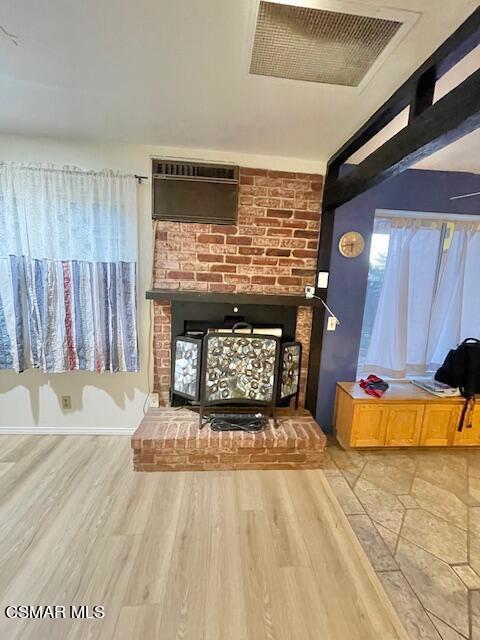 832 Katherine Road Simi Valley, CA 93063 - Photo 7 of 34 a view of fireplace and wooden floor