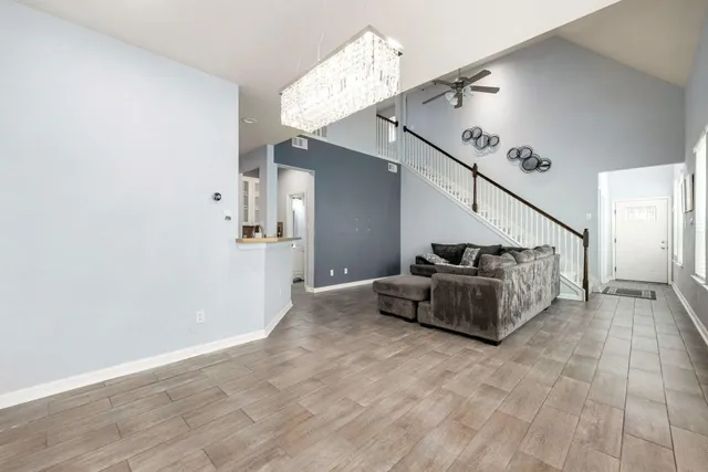 a kitchen with stainless steel appliances granite countertop a sink and a stove