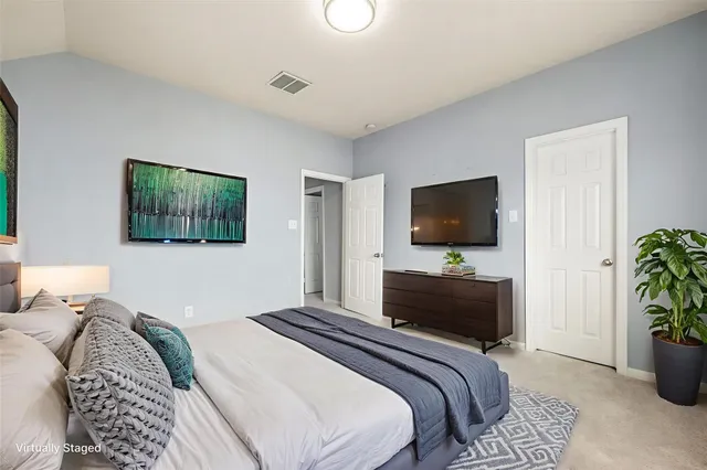 a view of a livingroom with a staircase