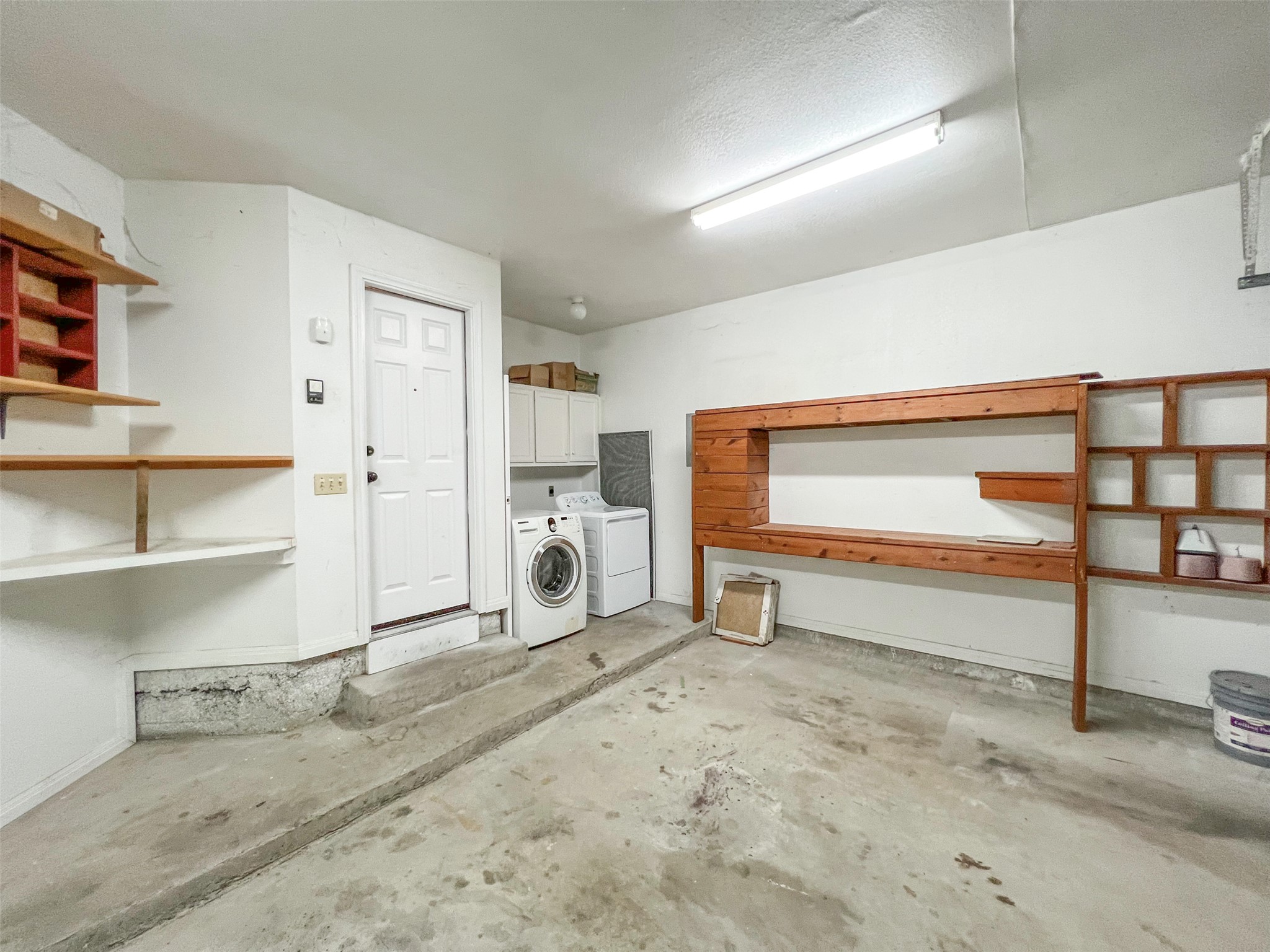 12010 Shady Springs Road Austin, TX 78758 - Photo 24 of 28 Garage and Laundry Room