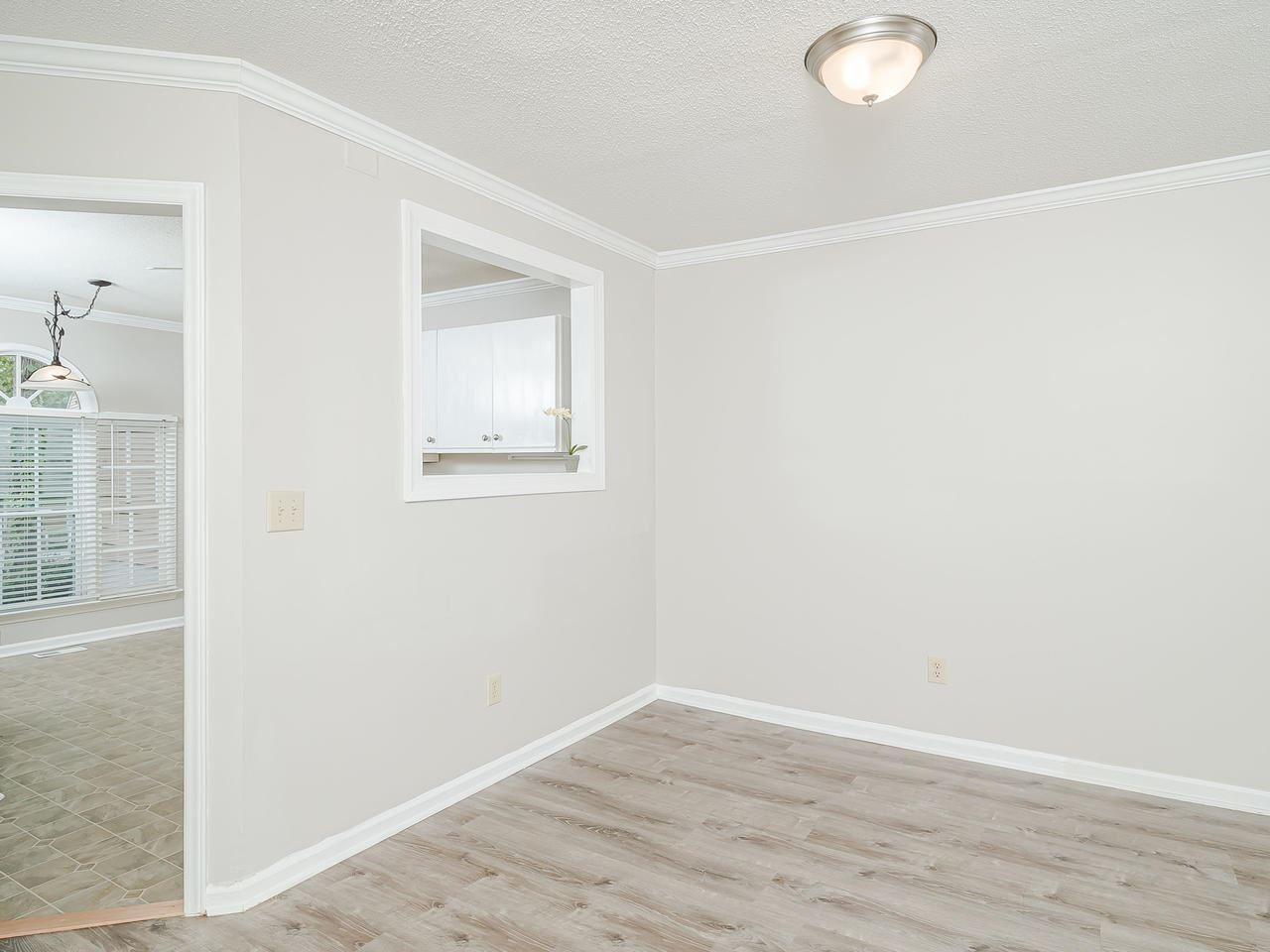 4524 Antique Lane Raleigh, NC 27616 - Photo 6 of 21 Kitchen Open to Living Room
