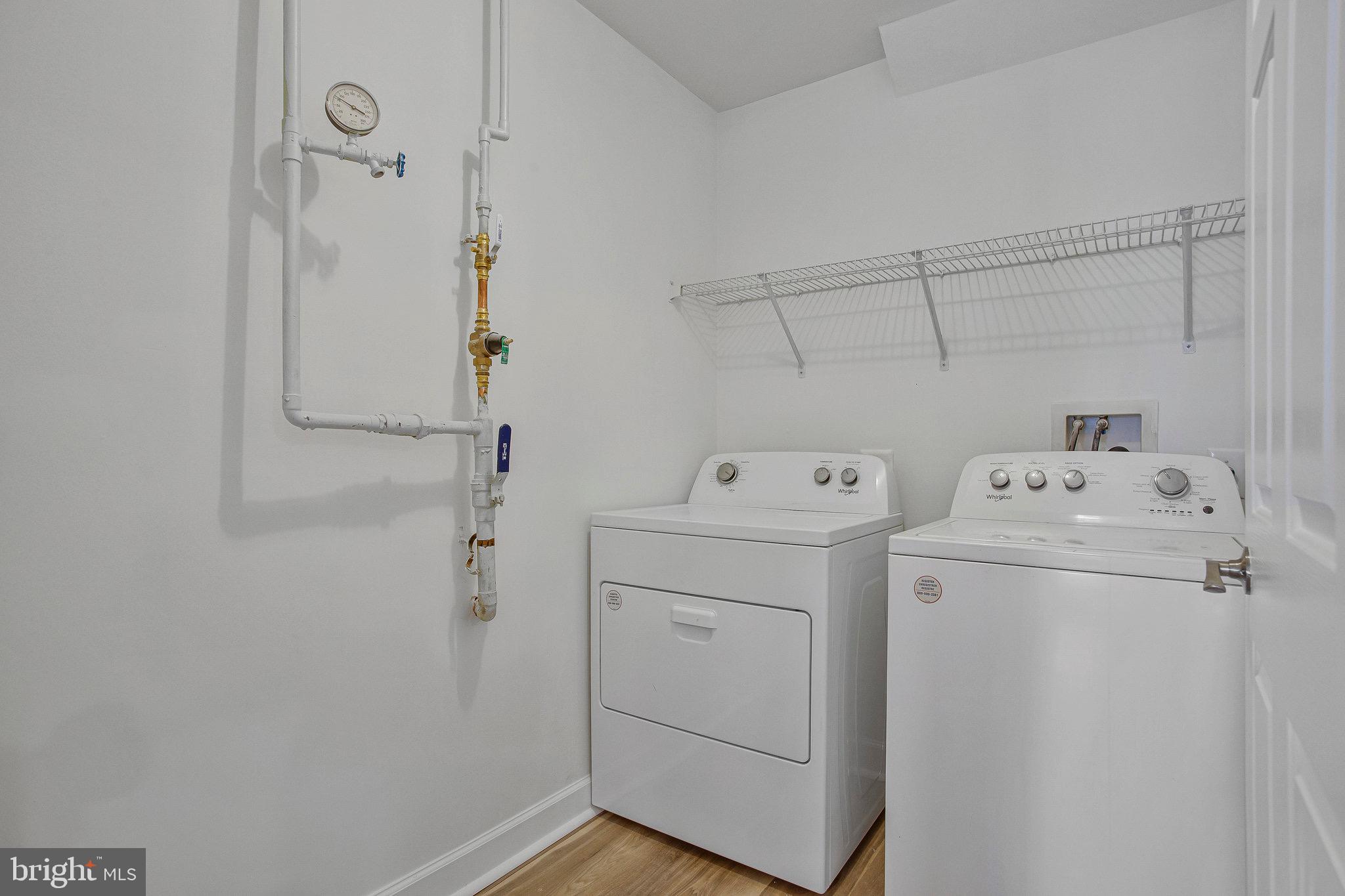 322 Hamlet Circle Edgewater, MD 21037 - Photo 16 of 21 a utility room with dryer and washer