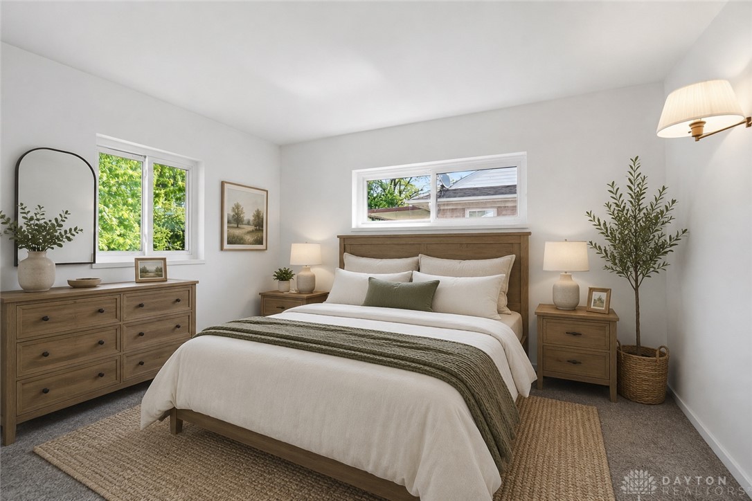 629 Storms Road Dayton, OH 45429 - Photo 4 of 51 This spacious primary bedroom features abundant natural light and ample storage.