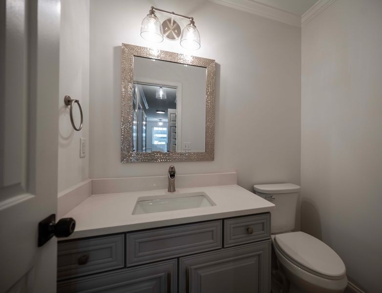 973 General George Patton Road Nashville, TN 37221 - Photo 9 of 15 a bathroom with a sink vanity mirror and toilet
