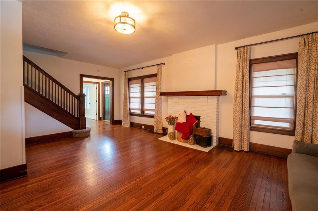 262 Cliffview Road Pittsburgh, PA 15212 - Photo 9 of 14 Spacious living room with fireplace