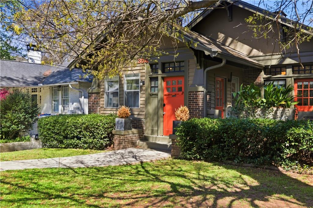 front view of a house with a yard