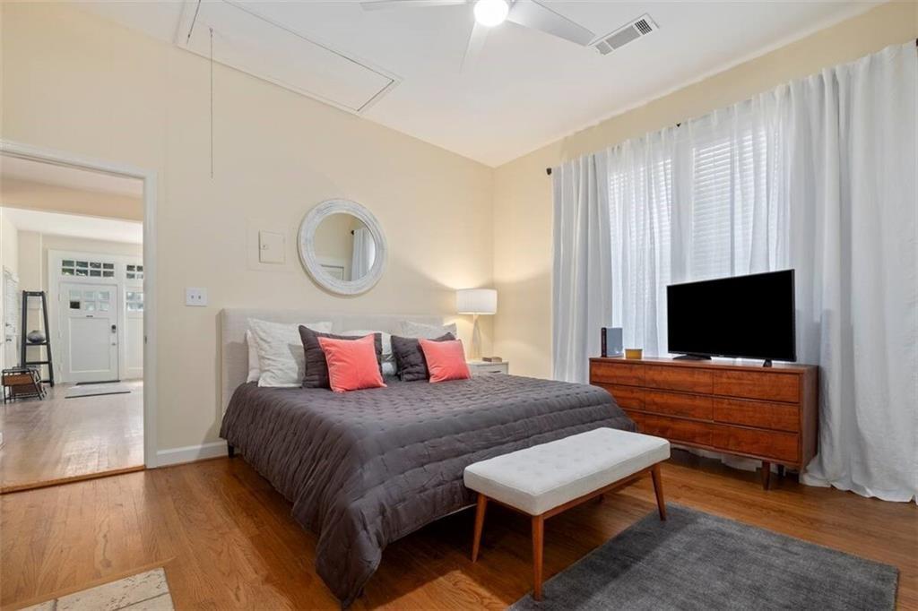 356 5th Street Northeast Atlanta, GA 30308 - Photo 14 of 54 a bedroom with a bed and a television