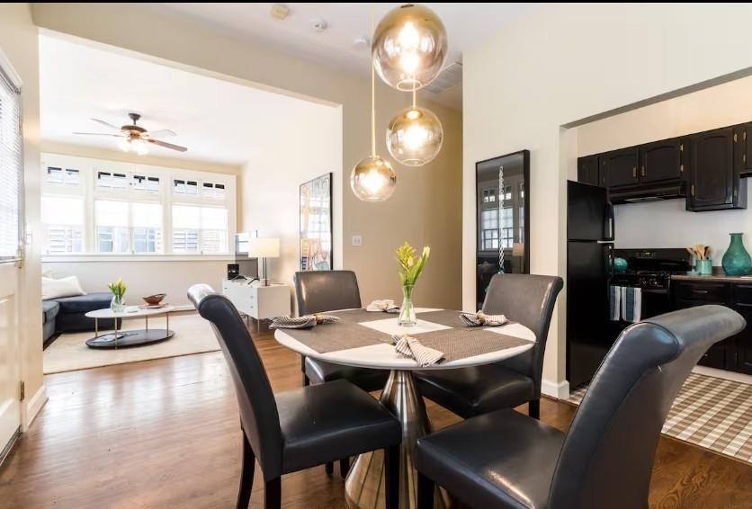 356 5th Street Northeast Atlanta, GA 30308 - Photo 26 of 54 a view of a dining room with furniture and wooden floor