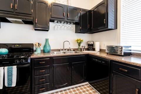 356 5th Street Northeast Atlanta, GA 30308 - Photo 27 of 54 a kitchen with stainless steel appliances granite countertop a sink a stove and cabinets