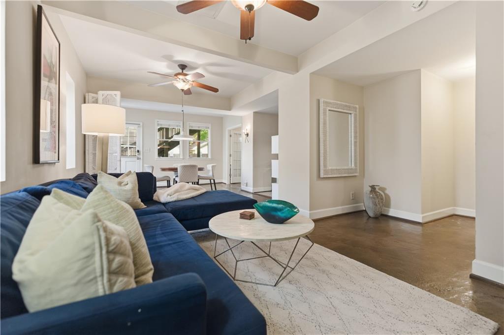 356 5th Street Northeast Atlanta, GA 30308 - Photo 39 of 54 a living room with furniture and a chandelier