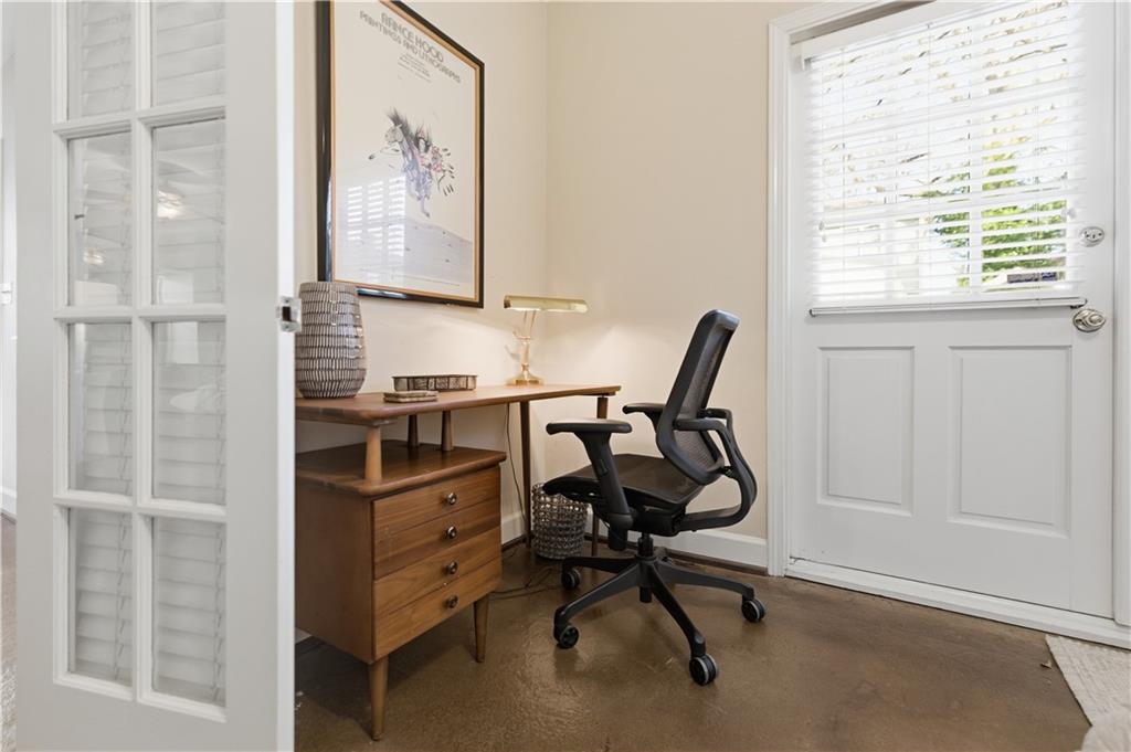356 5th Street Northeast Atlanta, GA 30308 - Photo 45 of 54 a view of a workspace with furniture and a window