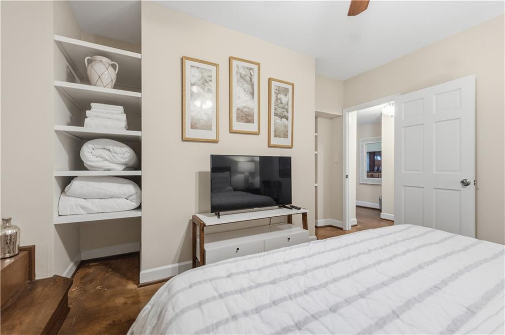 356 5th Street Northeast Atlanta, GA 30308 - Photo 50 of 54 a bedroom with a bed and a television