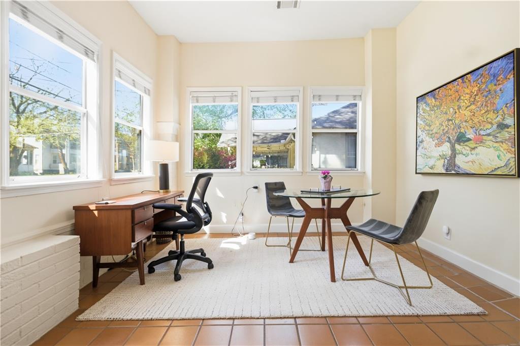 356 5th Street Northeast Atlanta, GA 30308 - Photo 5 of 54 a workspace with furniture and a large window