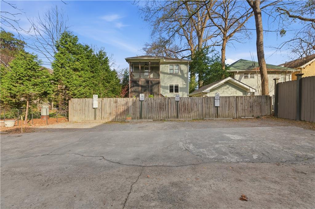 356 5th Street Northeast Atlanta, GA 30308 - Photo 54 of 54 a view of a house with a yard and large tree