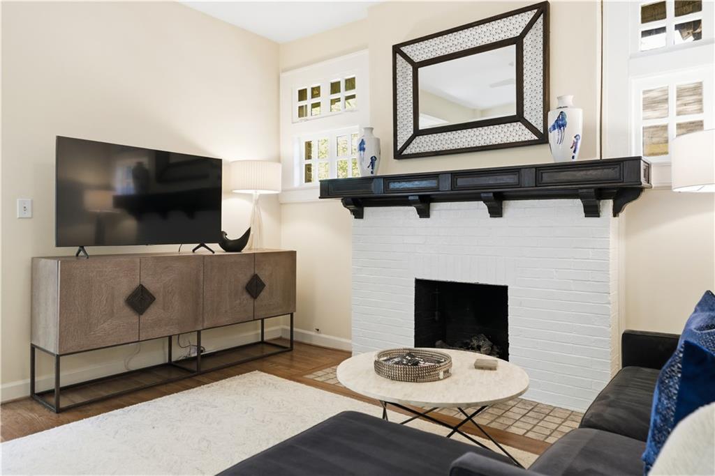 356 5th Street Northeast Atlanta, GA 30308 - Photo 9 of 54 a living room with furniture and a flat screen tv