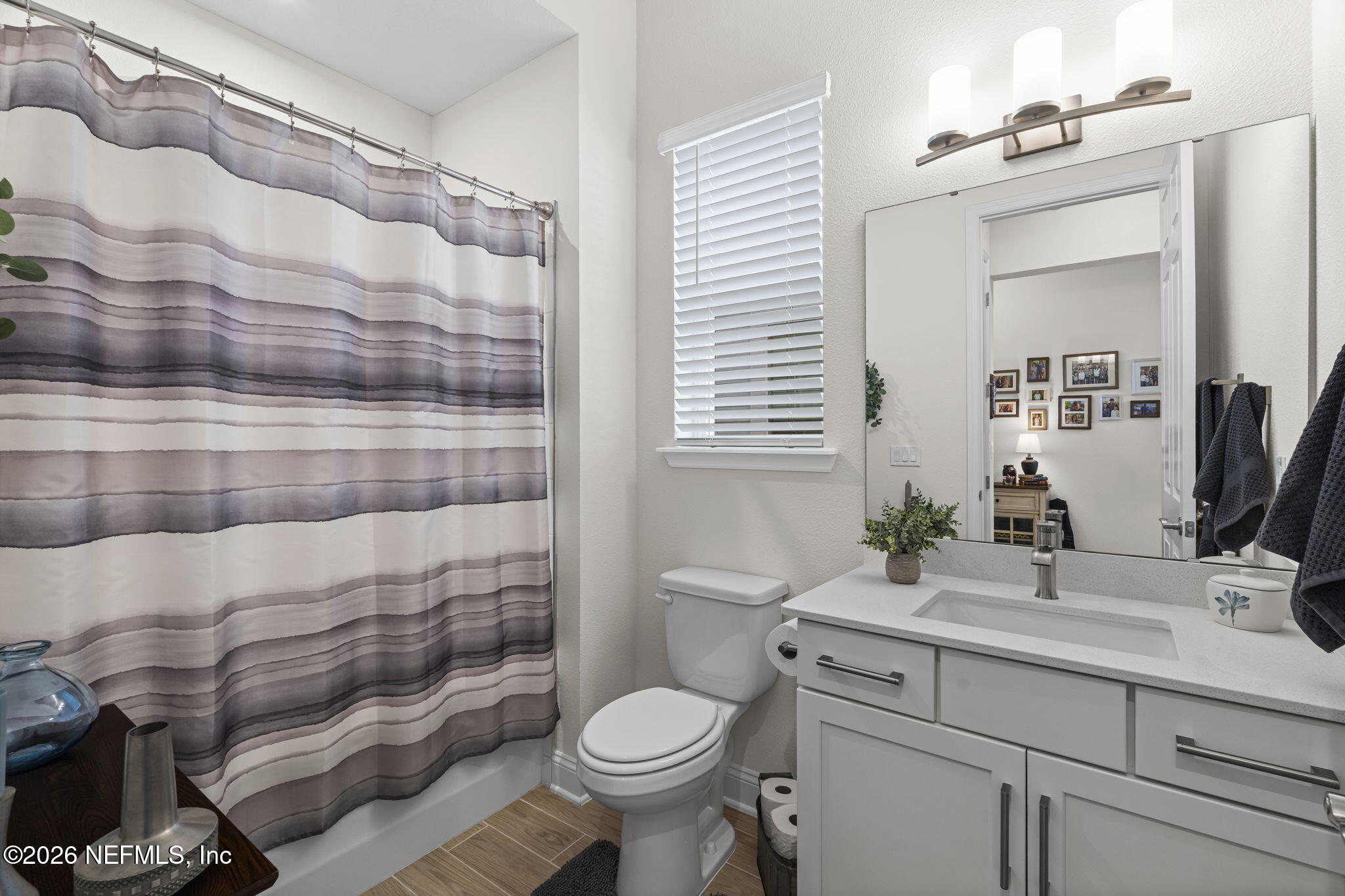 33 Pigeon Cove St. Johns, FL 32259 - Photo 14 of 37 a bathroom with a sink toilet and shower