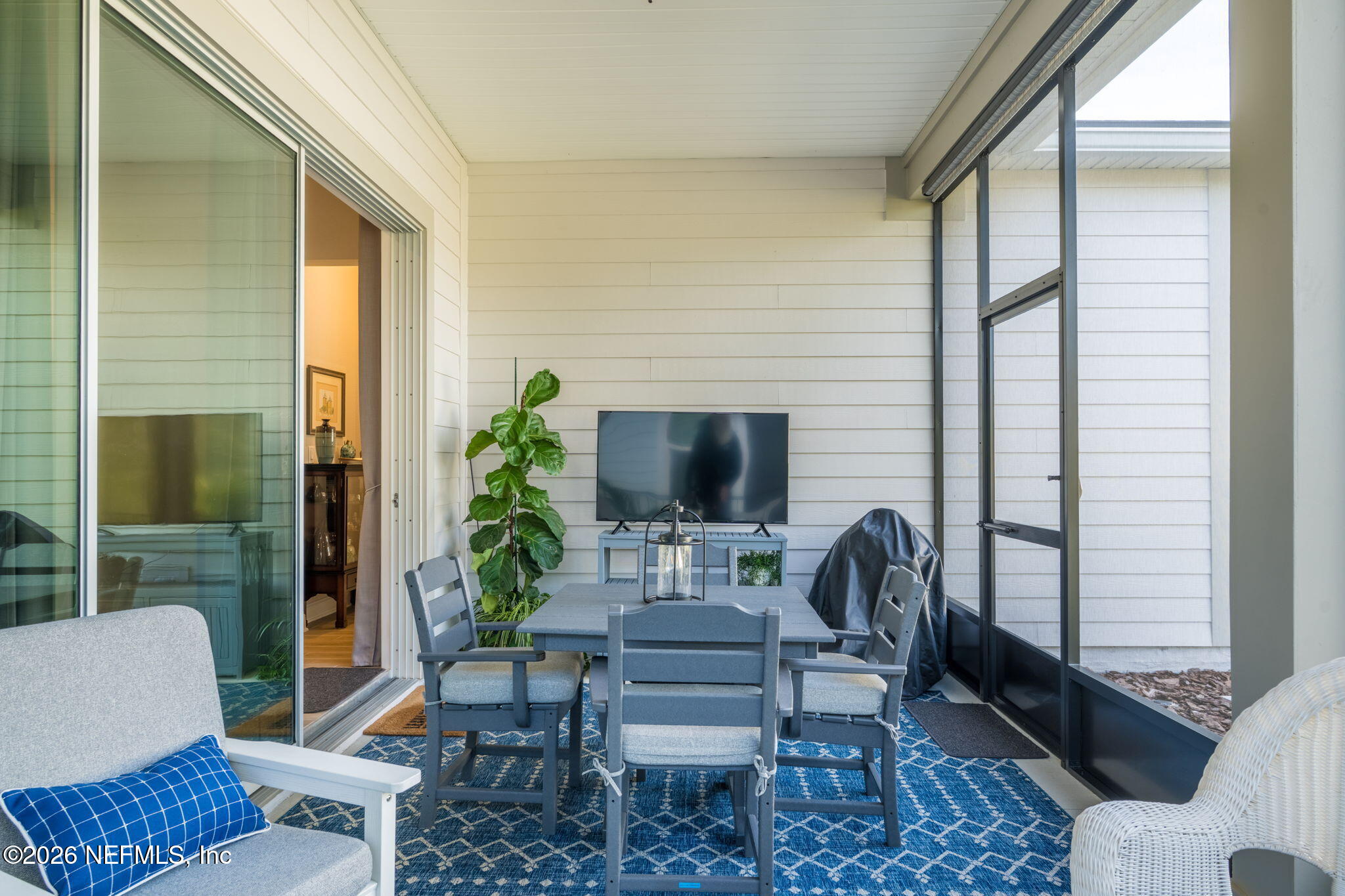 33 Pigeon Cove St. Johns, FL 32259 - Photo 17 of 37 a outdoor living space with furniture and a fireplace