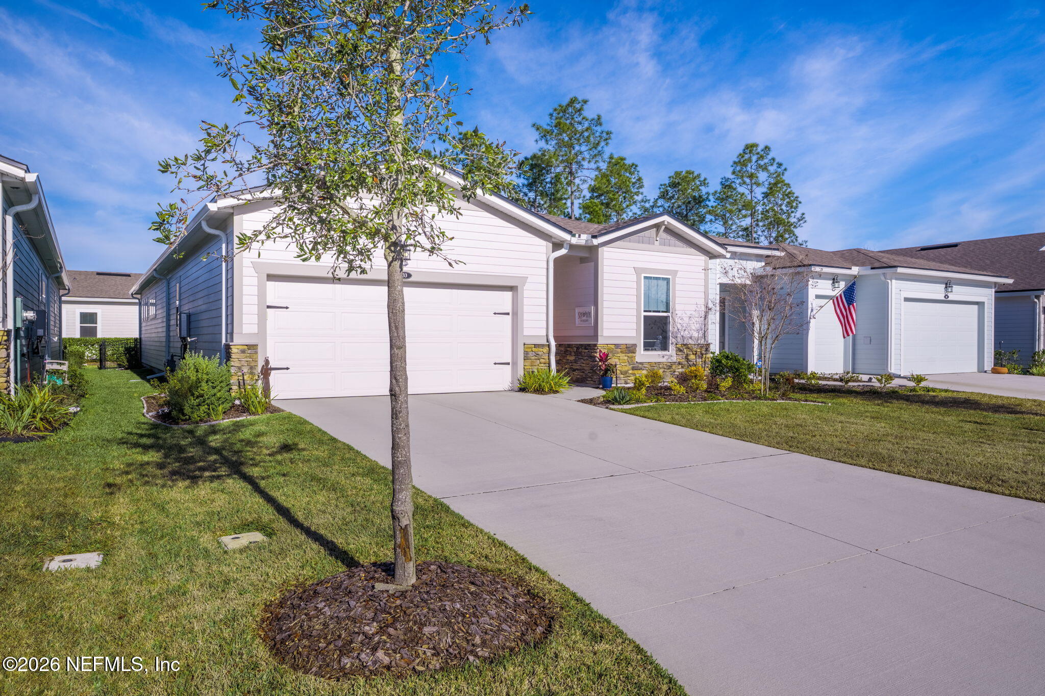 33 Pigeon Cove St. Johns, FL 32259 - Photo 2 of 37 a front view of house with yard and green space