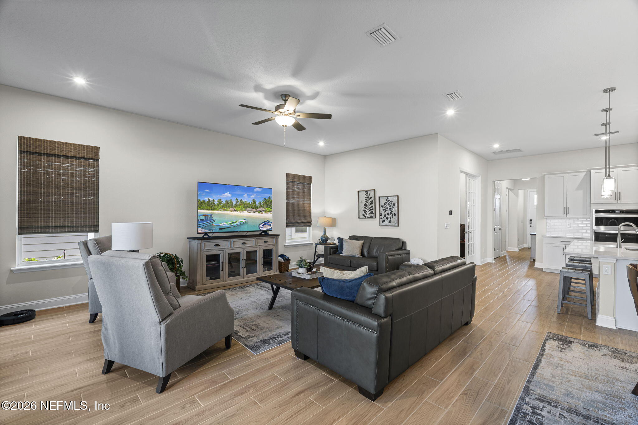 33 Pigeon Cove St. Johns, FL 32259 - Photo 9 of 37 a living room with furniture kitchen view and a window