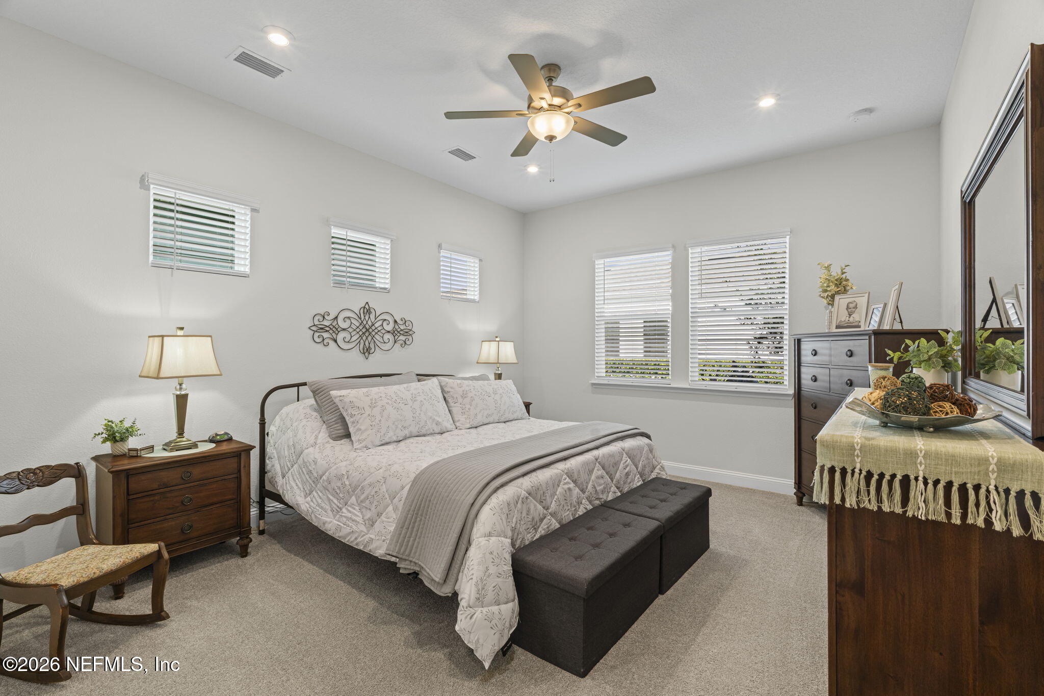 33 Pigeon Cove St. Johns, FL 32259 - Photo 10 of 37 a bedroom with a bed and a chandelier