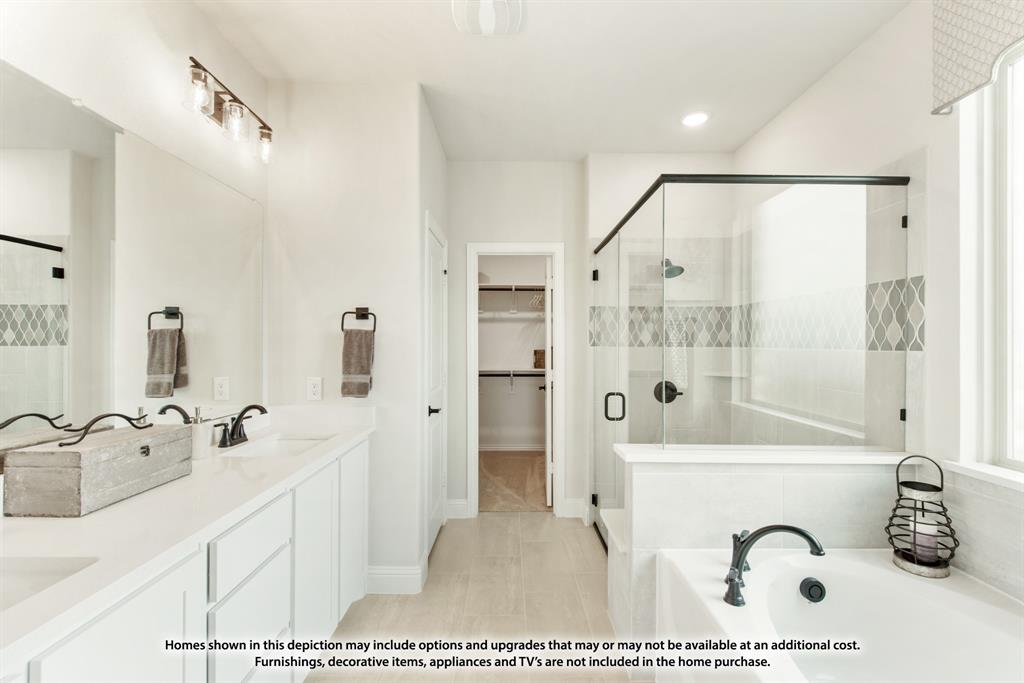 1108 Edgemire Lane Aubrey, TX 76227 - Photo 26 of 34 a bathroom with a tub sink and mirror