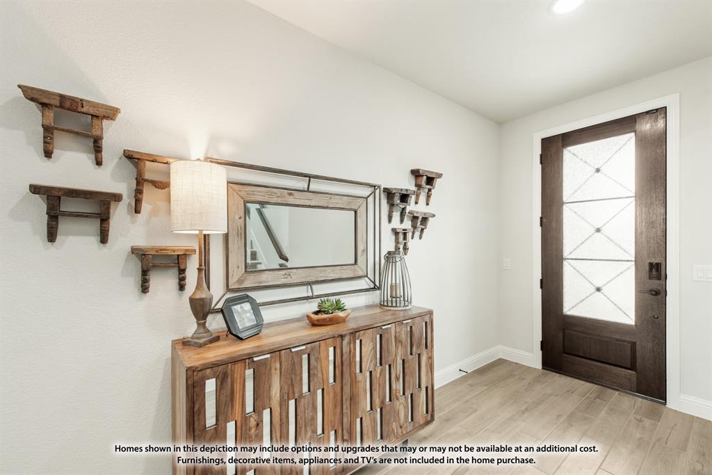 1108 Edgemire Lane Aubrey, TX 76227 - Photo 3 of 34 a view of entryway and hall with wooden floor