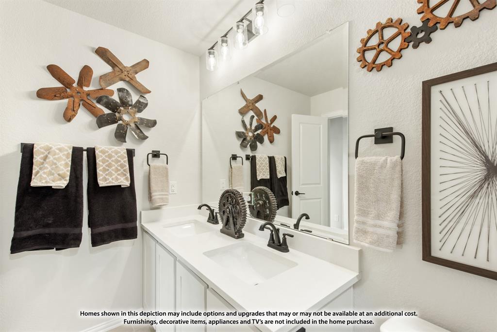 1108 Edgemire Lane Aubrey, TX 76227 - Photo 34 of 34 a bathroom with a sink vanity and mirror